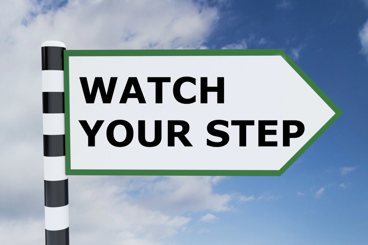 Photo of a sign showing the words, Watch Your Step